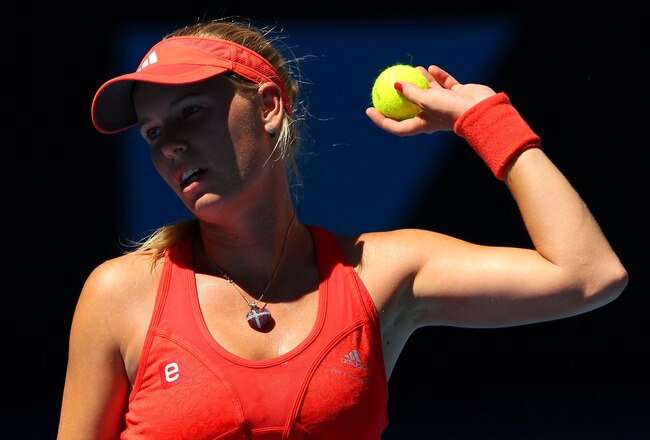 MELBOURNE, AUSTRALIA - JANUARY 24:  Caroline Wozniacki of Denmark reacts in her quarter final match against Kim Clijsters of Belgium during day nine of the 2012 Australian Open at Melbourne Park on January 24, 2012 in Melbourne, Australia.  (Photo by Lucas Dawson/Getty Images)