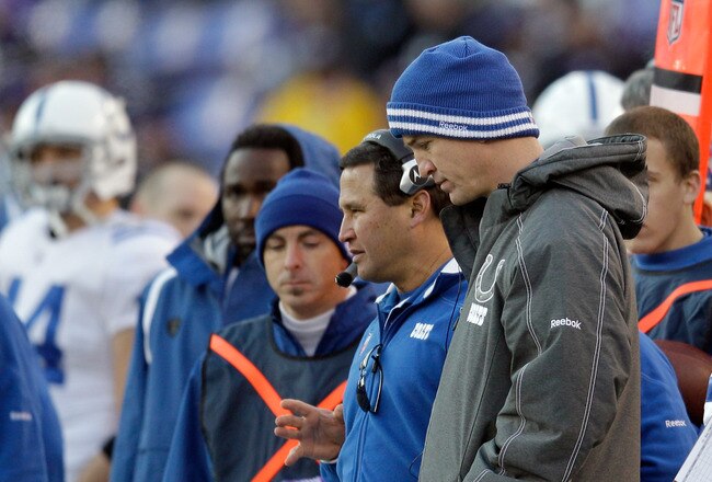 BALTIMORE, MD - DECEMBER 11:  Peyton Manning #18 (C) and Curtis Painter #7 of the Indianapolis Colts look on from the sidelines during the second half of the Colts and Baltimore Ravens game at M&T Bank Stadium on December 11, 2011 in Baltimore, Maryland.  (Photo by Rob Carr/Getty Images)