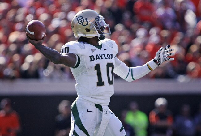 STILLWATER, OK - OCTOBER 29:  Quarterback Robert Griffin III #10 of the Baylor Bears looks to throw in the first half against the Oklahoma State Cowboys on October 29, 2011 at Boone Pickens Stadium in Stillwater, Oklahoma.  Oklahoma State defeated Baylor 59-24.  (Photo by Brett Deering/Getty Images)