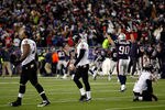 FOXBORO, MA - JANUARY 22:   Niko Koutouvides #90 of the New England Patriots celebrate after Billy Cundiff (C) #7 of the Baltimore Ravens missed a game tying field goal late in the fourth quarter during their AFC Championship Game at Gillette Stadium on January 22, 2012 in Foxboro, Massachusetts.  (Photo by Rob Carr/Getty Images)