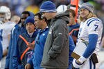 BALTIMORE, MD - DECEMBER 11:  Peyton Manning #18 (C) and Curtis Painter #7 of the Indianapolis Colts look on from the sidelines during the second half of the Colts and Baltimore Ravens game at M&T Bank Stadium on December 11, 2011 in Baltimore, Maryland.  (Photo by Rob Carr/Getty Images)