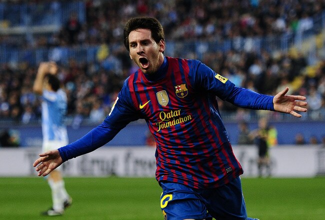 MALAGA, SPAIN - JANUARY 22:  Lionel Messi of FC Barcelona celebrates after scoring the opening goal during the La Liga match between Malaga CF and FC Barcelona at Rosaleda Stadium on January 22, 2012 in Malaga, Spain. FC Barcelona won 4-1. (Photo by David Ramos/Getty Images)