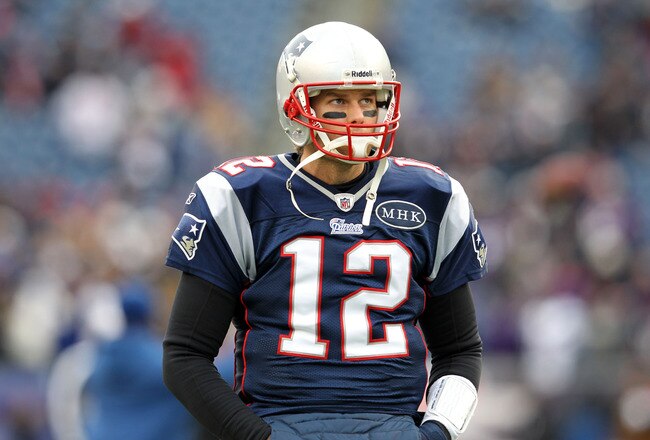 FOXBORO, MA - JANUARY 22:  Tom Brady #12 of the New England Patriots warms up prior to their AFC Championship Game against the Baltimore Ravens at Gillette Stadium on January 22, 2012 in Foxboro, Massachusetts.  (Photo by Jim Rogash/Getty Images)