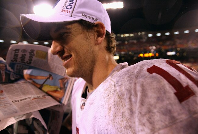 SAN FRANCISCO, CA - JANUARY 22:  Eli Manning #10 of the New York Giants walks off of the field after the Giants won 20-17 in overtime against the San Francisco 49ers during the NFC Championship Game at Candlestick Park on January 22, 2012 in San Francisco, California.  (Photo by Ezra Shaw/Getty Images)