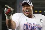 GLENDALE, AZ - FEBRUARY 03:  Defensive end Michael Strahan #92 of the New York Giants celebrates after defeating the New England Patriots 17-14 during Super Bowl XLII on February 3, 2008 at the University of Phoenix Stadium in Glendale, Arizona.  (Photo by Harry How/Getty Images)
