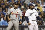 MILWAUKEE, WI - OCTOBER 16:  (L-R) Albert Pujols #5 of the St. Louis Cardinals and Prince Fielder #28 of the Milwaukee Brewers look on during Game Six of the National League Championship Series at Miller Park on October 16, 2011 in Milwaukee, Wisconsin.  (Photo by Christian Petersen/Getty Images)