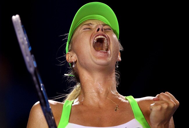 MELBOURNE, AUSTRALIA - JANUARY 23:  Maria Sharapova of Russia celebrates winning a point in her fourth round match against Sabine Lisicki of Germany during day eight of the 2012 Australian Open at Melbourne Park on January 23, 2012 in Melbourne, Australia.  (Photo by Scott Barbour/Getty Images)