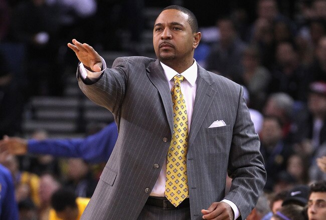 OAKLAND, CA - JANUARY 07:  Head coach Mark Jackson of the Golden State Warriors stands on the sidelines during their game against the Utah Jazz at Oracle Arena on January 7, 2012 in Oakland, California.  NOTE TO USER: User expressly acknowledges and agrees that, by downloading and or using this photograph, User is consenting to the terms and conditions of the Getty Images License Agreement.  (Photo by Ezra Shaw/Getty Images)