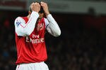 LONDON, ENGLAND - JANUARY 22: Robin van Persie of Arsenal (L) reacts after a missed chance during the Barclays Premier League match between Arsenal and Manchester United at Emirates Stadium on January 22, 2012 in London, England.  (Photo by Mike Hewitt/Getty Images)