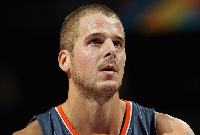 DENVER, CO - MARCH 02:  Joel Pryzbilla #10 of the Charlotte Bobcats takes a free throw against the Denver Nuggets at the Pepsi Center on March 2, 2011 in Denver, Colorado. The Nuggets defeated the Bobcats 120-80.NOTE TO USER: User expressly acknowledges and agrees that, by downloading and or using this photograph, User is consenting to the terms and conditions of the Getty Images License Agreement.  (Photo by Doug Pensinger/Getty Images)