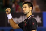 MELBOURNE, AUSTRALIA - JANUARY 23:  Novak Djokovic of Serbia celebrates winning a point in his fourth round match against Lleyton Hewitt of Australia during day eight of the 2012 Australian Open at Melbourne Park on January 23, 2012 in Melbourne, Australia.  (Photo by Mark Kolbe/Getty Images)