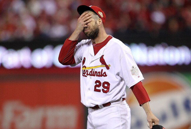ST LOUIS, MO - OCTOBER 28:  Chris Carpenter #29 of the St. Louis Cardinals wipes his face on the mound in the fifth inning during Game Seven of the MLB World Series against the Texas Rangers at Busch Stadium on October 28, 2011 in St Louis, Missouri.  (Photo by Ezra Shaw/Getty Images)