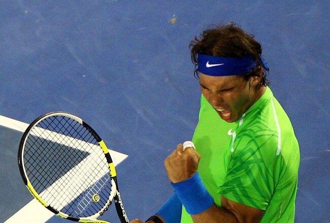 MELBOURNE, AUSTRALIA - JANUARY 24:  Rafael Nadal of Spain celebrates a point in his quarter final match against Tomas Berdych of the Czech Republic during day nine of the 2012 Australian Open at Melbourne Park on January 24, 2012 in Melbourne, Australia.  (Photo by Mark Dadswell/Getty Images)