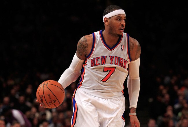NEW YORK, NY - JANUARY 09:  Carmelo Anthony #7 of the New York Knicks dribbles against the Charlotte Bobcats at Madison Square Garden on January 9, 2012 in New York City. NOTE TO USER: User expressly acknowledges and agrees that, by downloading and or using this photograph, User is consenting to the terms and conditions of the Getty Images License Agreement.  (Photo by Chris Trotman/Getty Images)