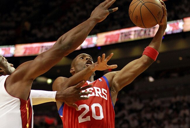 MIAMI, FL - APRIL 16: Guard Jodie Meeks #20 of the Philadelphia 76ers drives against Dwyane Wade #3 of the Miami Heat at the American Airlines Arena in Game One of the Eastern Conference Quarterfinals in the 2011 NBA Playoffs on April 16, 2011 in Miami, Florida.The Heat defeated the 76ers 97-89.  NOTE TO USER: User expressly acknowledges and agrees that, by downloading and or using this photograph, User is consenting to the terms and conditions of the Getty Images Liscence agreement.  (Photo by Marc Serota/Getty Images)
