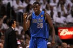 MIAMI, FL - JUNE 12:  Ian Mahinmi #28 of the Dallas Mavericks celebrates after he made a basket at the buzzer of the end of the third quarter against the Miami Heat in Game Six of the 2011 NBA Finals at American Airlines Arena on June 12, 2011 in Miami, Florida. NOTE TO USER: User expressly acknowledges and agrees that, by downloading and/or using this Photograph, user is consenting to the terms and conditions of the Getty Images License Agreement.  (Photo by Ronald Martinez/Getty Images)