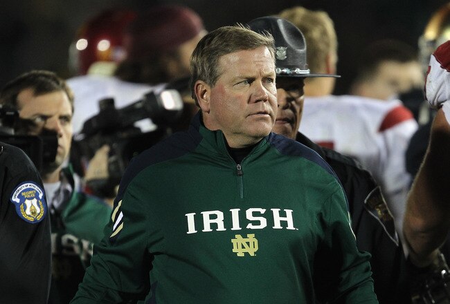 SOUTH BEND, IN - OCTOBER 22: Head coach Brian Kelly of the Notre Dame Fighting Irish leaves the field after a loss to the University of Southern California Trojans at Notre Dame Stadium on October 22, 2011 in South Bend, Indiana. USC defeated Notre Dame 31-17. (Photo by Jonathan Daniel/Getty Images)
