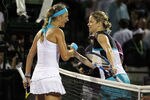KEY BISCAYNE, FL - MARCH 30:  (L-R) Victoria Azarenka of Belarus is congratulated by Kim Clijsters of Belgium after Azarenka won their match during the Sony Ericsson Open at Crandon Park Tennis Center on March 30, 2011 in Key Biscayne, Florida.  (Photo by Al Bello/Getty Images)