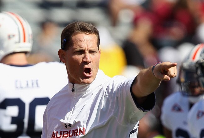 COLUMBIA, SC - OCTOBER 01:  Head coach Gene Chizik of the Auburn Tigers yells to his team before their game against the South Carolina Gamecocks at Williams-Brice Stadium on October 1, 2011 in Columbia, South Carolina.  (Photo by Streeter Lecka/Getty Images)
