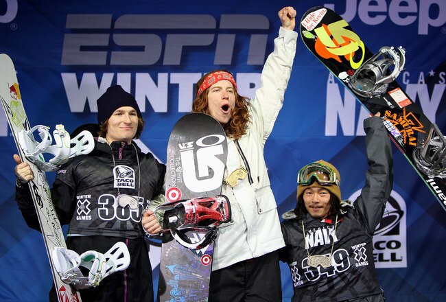 ASPEN, CO - JANUARY 29:  Shaun White (C) of the USA takes the podium after winning the gold medal in the Men's Snowboard Superpipe along with Iouri Podladtchikov (L) of Switzerland in second place and Kazuhiro Kokubo (R) of Japan in third place at Winter X Games 14 at Buttermilk Mountain on January 29, 2010 in Aspen, Colorado.  (Photo by Doug Pensinger/Getty Images)