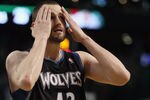 BOSTON, MA - JANUARY 03:  Kevin Love #42 of the Minnesota Timberwolves wipes his face in the fourth quarter against the Boston Celtics on January 3, 2011 at the TD Garden in Boston, Massachusetts. The Celtics defeated the Timberwolves 96-93. NOTE TO USER: User expressly acknowledges and agrees that, by downloading and/or using this Photograph, User is consenting to the terms and conditions of the Getty Images License Agreement.  (Photo by Elsa/Getty Images)