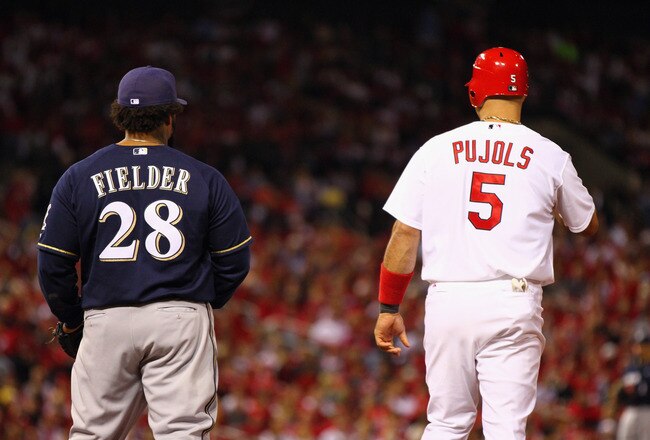 ST LOUIS, MO - OCTOBER 14:  Prince Fielder #28 of the Milwaukee Brewers and Albert Pujols #5 of the St. Louis Cardinals stnad near first base during Game Five of the National League Championship Series at Busch Stadium on October 14, 2011 in St Louis, Missouri.  (Photo by Dilip Vishwanat/Getty Images)