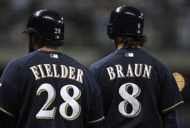 MILWAUKEE, WI - OCTOBER 10:  (L-R) Prince Fielder #28 and Ryan Braun #8 of the Milwaukee Brewers stand on the field against the St. Louis Cardinals during Game Two of the National League Championship Series at Miller Park on October 10, 2011 in Milwaukee, Wisconsin. The Cardinals won 12-3. (Photo by Jonathan Daniel/Getty Images)