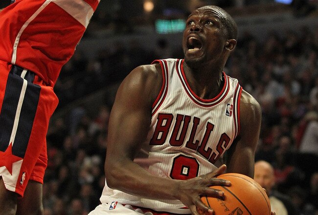 CHICAGO, IL - JANUARY 11:  Loul Deng #9 of the Chicago Bulls moves against John Wall #2 of the Washington Wizards at the United Center on January 11, 2012 in Chicago, Illinois. The Bulls defeated the Wizards 78-64. NOTE TO USER: User expressly acknowledges and agrees that, by downloading and or using this photograph, User is consenting to the terms and conditions of the Getty Images License Agreement.  (Photo by Jonathan Daniel/Getty Images)