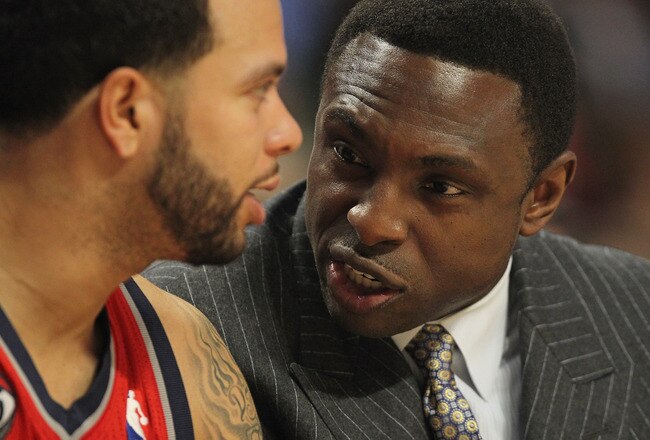 CHICAGO, IL - JANUARY 23: Head coach Avery Johnson of the New Jersey Nets talks with Deron Williams #8 on the bench during a game against the Chicago Bulls at the United Center on January 23, 2012 in Chicago, Illinois. The Bulls defeated the Nets 110-95. NOTE TO USER: User expressly acknowledges and agrees that, by downloading and or using this photograph, User is consenting to the terms and conditions of the Getty Images License Agreement. (Photo by Jonathan Daniel/Getty Images)