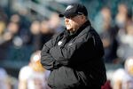 PHILADELPHIA, PA - JANUARY 01: Head coach Andy Reid of the Philadelphia Eagles watches his team warm up before playing the Washington Redskins at Lincoln Financial Field on January 1, 2012 in Philadelphia, Pennsylvania.  (Photo by Rob Carr/Getty Images)
