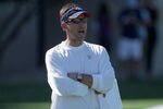 ENGLEWOOD, CO - JULY 28:  Dennis Allen, Defensive Coordinator of the Denver Broncos directs the defense during training camp at the Paul D. Bowlen Memorial Broncos Centre at Dove Valley on July 28, 2011 in Englewood, Colorado.  (Photo by Doug Pensinger/Getty Images)