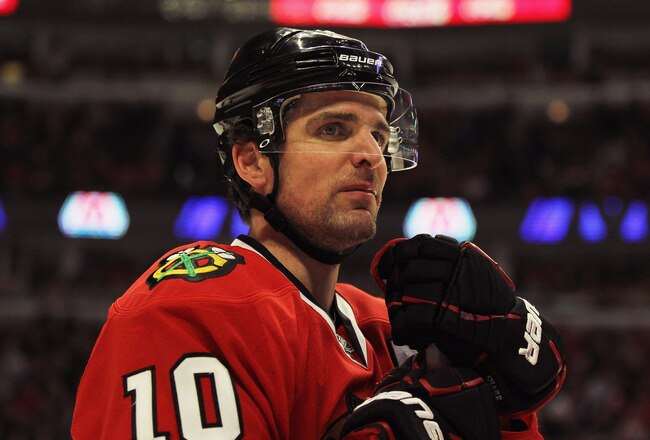 CHICAGO, IL - DECEMBER 30:  Patrick Sharp #10 of the Chicago Blackhawks rests during a break in the action against the Detroit Red Wings at the United Center on December 30, 2011 in Chicago, Illinois. The Blackhawks defeated the Red Wings 3-2.  (Photo by Jonathan Daniel/Getty Images)