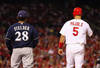 ST LOUIS, MO - OCTOBER 14:  Prince Fielder #28 of the Milwaukee Brewers and Albert Pujols #5 of the St. Louis Cardinals stnad near first base during Game Five of the National League Championship Series at Busch Stadium on October 14, 2011 in St Louis, Missouri.  (Photo by Dilip Vishwanat/Getty Images)