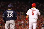 ST LOUIS, MO - OCTOBER 14:  Prince Fielder #28 of the Milwaukee Brewers and Albert Pujols #5 of the St. Louis Cardinals stnad near first base during Game Five of the National League Championship Series at Busch Stadium on October 14, 2011 in St Louis, Missouri.  (Photo by Dilip Vishwanat/Getty Images)