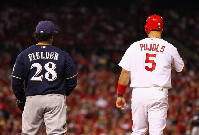 ST LOUIS, MO - OCTOBER 14:  Prince Fielder #28 of the Milwaukee Brewers and Albert Pujols #5 of the St. Louis Cardinals stnad near first base during Game Five of the National League Championship Series at Busch Stadium on October 14, 2011 in St Louis, Missouri.  (Photo by Dilip Vishwanat/Getty Images)