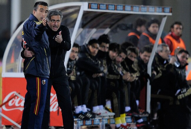 PALMA DE MALLORCA, SPAIN - JANUARY 14:  Real Madrid head coach Jose Mourinho (R) talks to a match official during the La Liga match between RCD Mallorca and Real Madrid at Iberostar Stadium on January 14, 2012 in Palma de Mallorca, Spain.  (Photo by Denis Doyle/Getty Images)