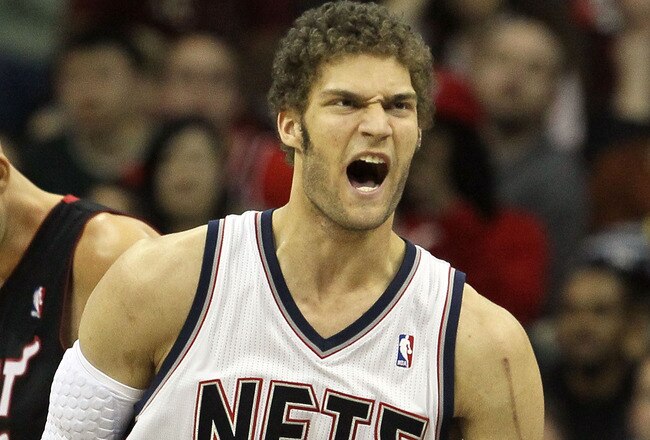 NEWARK, NJ - APRIL 03:  Brook Lopez #11 of the New Jersey Nets reacts against the Miami Heat at the Prudential Center on April 3, 2011 in Newark, New Jersey.The Heat defeated the Nets 108-94.NOTE TO USER: User expressly acknowledges and agrees that, by downloading and/or using this Photograph, user is consenting to the terms and conditions of the Getty Images License Agreement.  (Photo by Jim McIsaac/Getty Images)