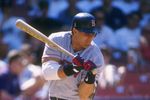 26 May 1996:  Outfielder Jose Canseco of the Boston Red Sox cringes as he pulls his left arm into his body after being struck by a pitch during an at-bat in the Red Sox 12-2 loss to the California Angels at Anaheim Stadium in Anaheim, California. Mandator