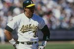OAKLAND, CA - APRIL 3:  Jose Canseco of the Oakland Athletics looks on during the game against the Cleveland Indians at Oakland-Alameda County Coliseum on April 3, 1997 in Oakland, California. (Photo by Otto Greule Jr/Getty Images)