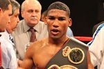 ATLANTIC CITY, NJ - MARCH 26: Featherweight Yuriorkis Gamboa wears the championship belt after winning the IBF WBA World Featherweight title by beating Jorge Solis of Mexico during Top Rank's 'Featherweight Fury' on March 26, 2011 at Boardwalk Hall in Atlantic City, New Jersey. (Photo by Hunter Martin/Getty Images)