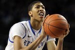 LEXINGTON, KY - JANUARY 03:  Anthony Davis #23 of the Kentucky Wildcats shoots a free throw during the game against the Arkansas-Little Rock Trojans at Freedom Hall on January 3, 2012 in Louisville , Kentucky.  (Photo by Andy Lyons/Getty Images)