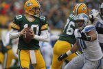 GREEN BAY, WI - JANUARY 01:  Matt Flynn #10 of the Green Bay Packerslooks for a receiver as Ndamukong Suh #90 of the Detroit Lions rushes at Lambeau Field on January 1, 2012 in Green Bay, Wisconsin. The Packers defeated the Lions 45-41.  (Photo by Jonathan Daniel/Getty Images)