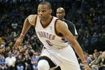 OKLAHOMA CITY, OK -DECEMBER 25:  Russell Westbrook #0 of the Oklahoma City Thunder drives inside during the NBA season opening game against the Orlando Magic December 25, 2011 at the Chesapeake Energy Arena in Oklahoma City, Oklahoma.  Oklahoma City defeated Orlando 97-89. NOTE TO USER: User expressly acknowledges and agrees that, by downloading and or using this Photograph, user is consenting to the terms and conditions of the Getty Images License Agreement.  (Photo by Brett Deering/Getty Images)