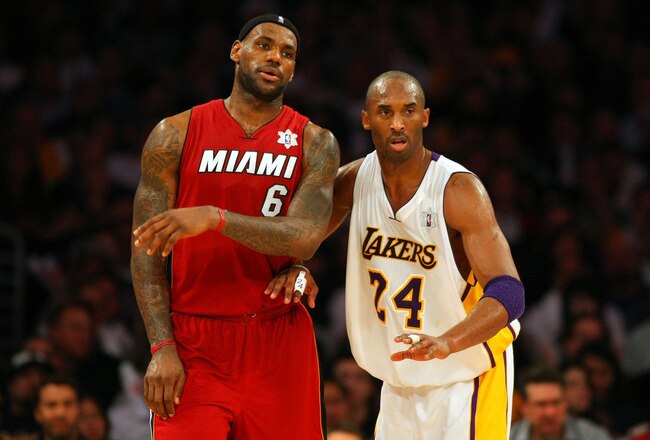 LOS ANGELES, CA - DECEMBER 25:  Kobe Bryant #24 of the Los Angeles Lakers defends LeBron James #6 of the Miami Heat during the NBA game at Staples Center on December 25, 2010 in Los Angeles, California. The Heat defeated the Lakers 96-80.  NOTE TO USER: User expressly acknowledges and agrees that, by downloading and or using this photograph, User is consenting to the terms and conditions of the Getty Images License Agreement.  (Photo by Victor Decolongon/Getty Images)