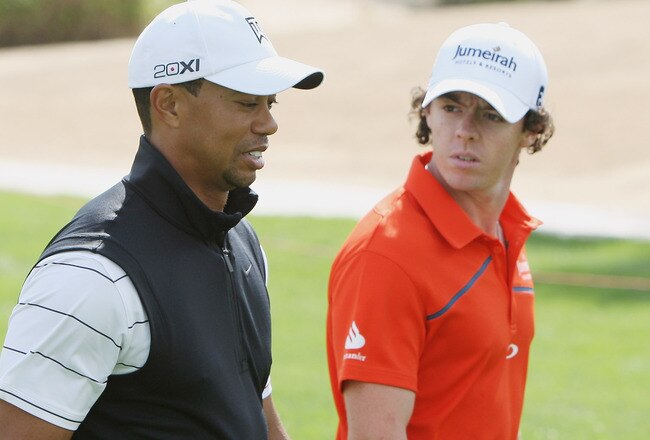 ABU DHABI, UNITED ARAB EMIRATES - JANUARY 24:  Tiger Woods of the USA (L) walks alongside Rory McIlroy of Northern Ireland during a practice round prior to the start of the Abu Dhabi HSBC Golf Championship at the Abu Dhabi Golf Club on January 24, 2012 in Abu Dhabi, United Arab Emirates.  (Photo by Scott Halleran/Getty Images)