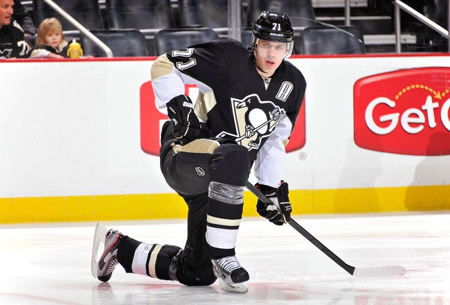 PITTSBURGH, PA - JANUARY 10:  Evgeni Malkin #71 of the Pittsburgh Penguins stretches before a game against the Ottawa Senators on January 10, 2012 at CONSOL Energy Center in Pittsburgh, Pennsylvania.  (Photo by Jamie Sabau/Getty Images)