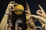OMAHA, NE - JUNE 28:  The South Carolina Gamecocks celebrate with the trophy after winning the men's 2011 NCAA College Baseball World Series at TD Ameritrade Park Omaha on June 28, 2011 in Omaha, Nebraska.  The Gamecocks defeated the Florida Gators 5-2 and won the series 2-0.  (Photo by Ronald Martinez/Getty Images)