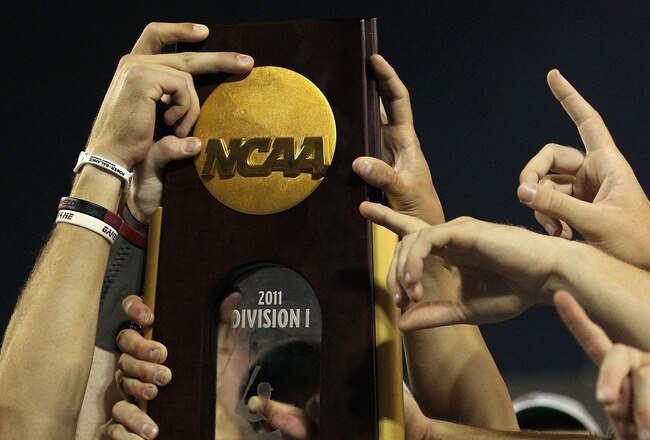 OMAHA, NE - JUNE 28:  The South Carolina Gamecocks celebrate with the trophy after winning the men's 2011 NCAA College Baseball World Series at TD Ameritrade Park Omaha on June 28, 2011 in Omaha, Nebraska.  The Gamecocks defeated the Florida Gators 5-2 and won the series 2-0.  (Photo by Ronald Martinez/Getty Images)