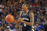 LOUISVILLE, KY - DECEMBER 08:  Eric Atkins #0 of the Notre Dame Fighting Irish dribbles the ball during the game against the Kentucky Wildcats in the 2010 DIRECTV SEC/BIG EAST Invitational at Freedom Hall on December 8, 2010 in Louisville, Kentucky.  (Photo by Andy Lyons/Getty Images)
