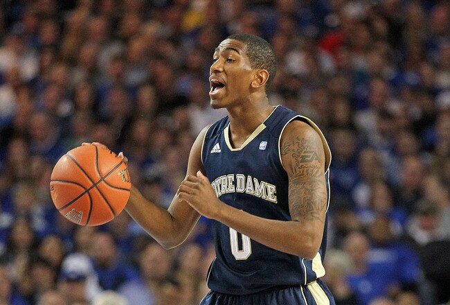 LOUISVILLE, KY - DECEMBER 08:  Eric Atkins #0 of the Notre Dame Fighting Irish dribbles the ball during the game against the Kentucky Wildcats in the 2010 DIRECTV SEC/BIG EAST Invitational at Freedom Hall on December 8, 2010 in Louisville, Kentucky.  (Photo by Andy Lyons/Getty Images)